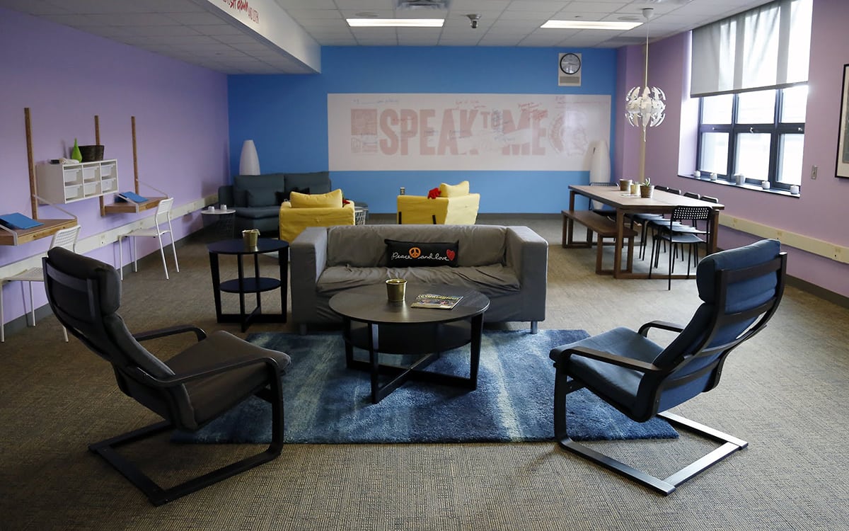 At Montour High School’s empathy room, students have a quiet place with couches where they can talk and post messages encouraging acts of kindness on the wall.