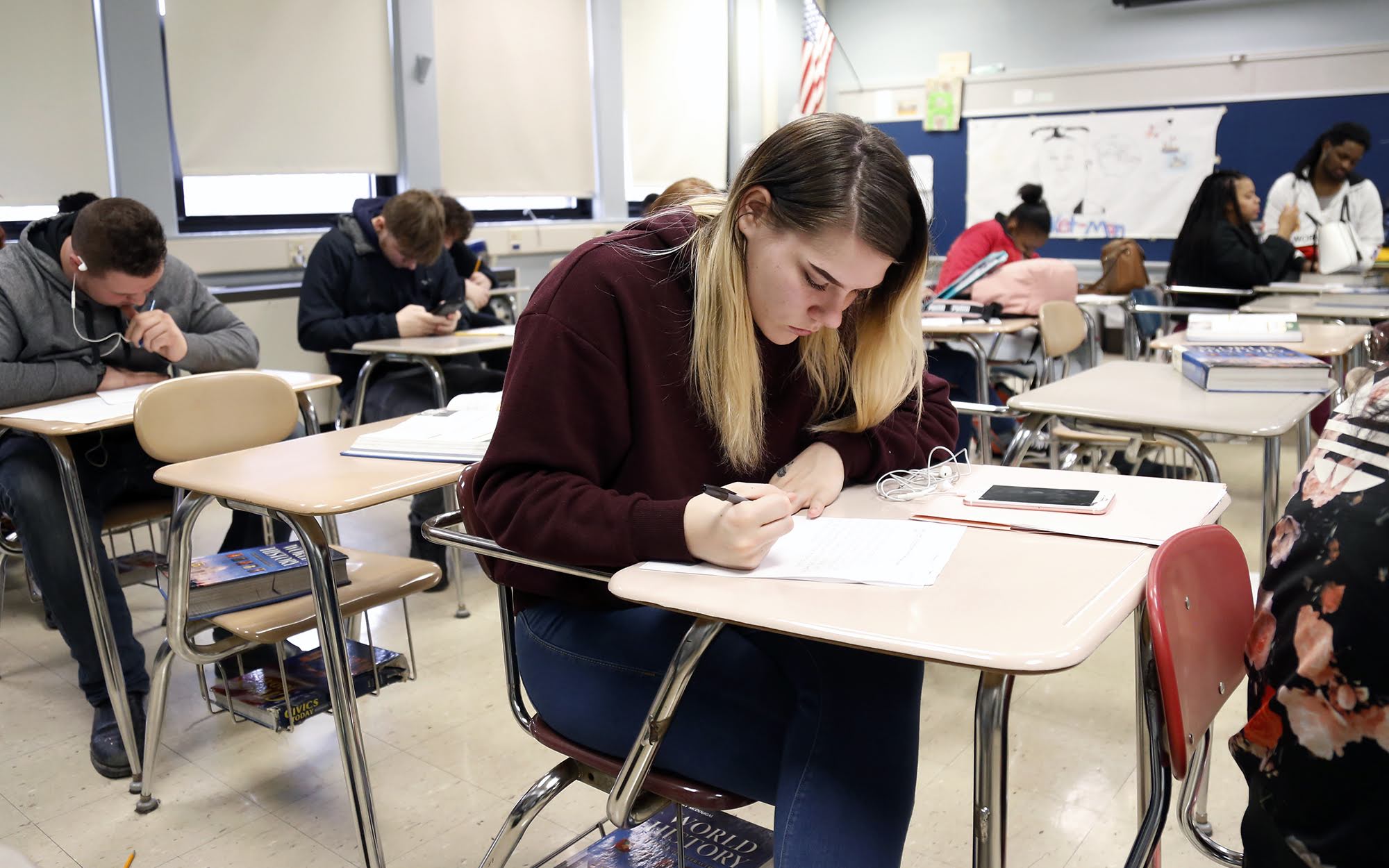 In March, Sto-Rox Junior-Senior High School student Lexi Frazee works in a comparative religions class.