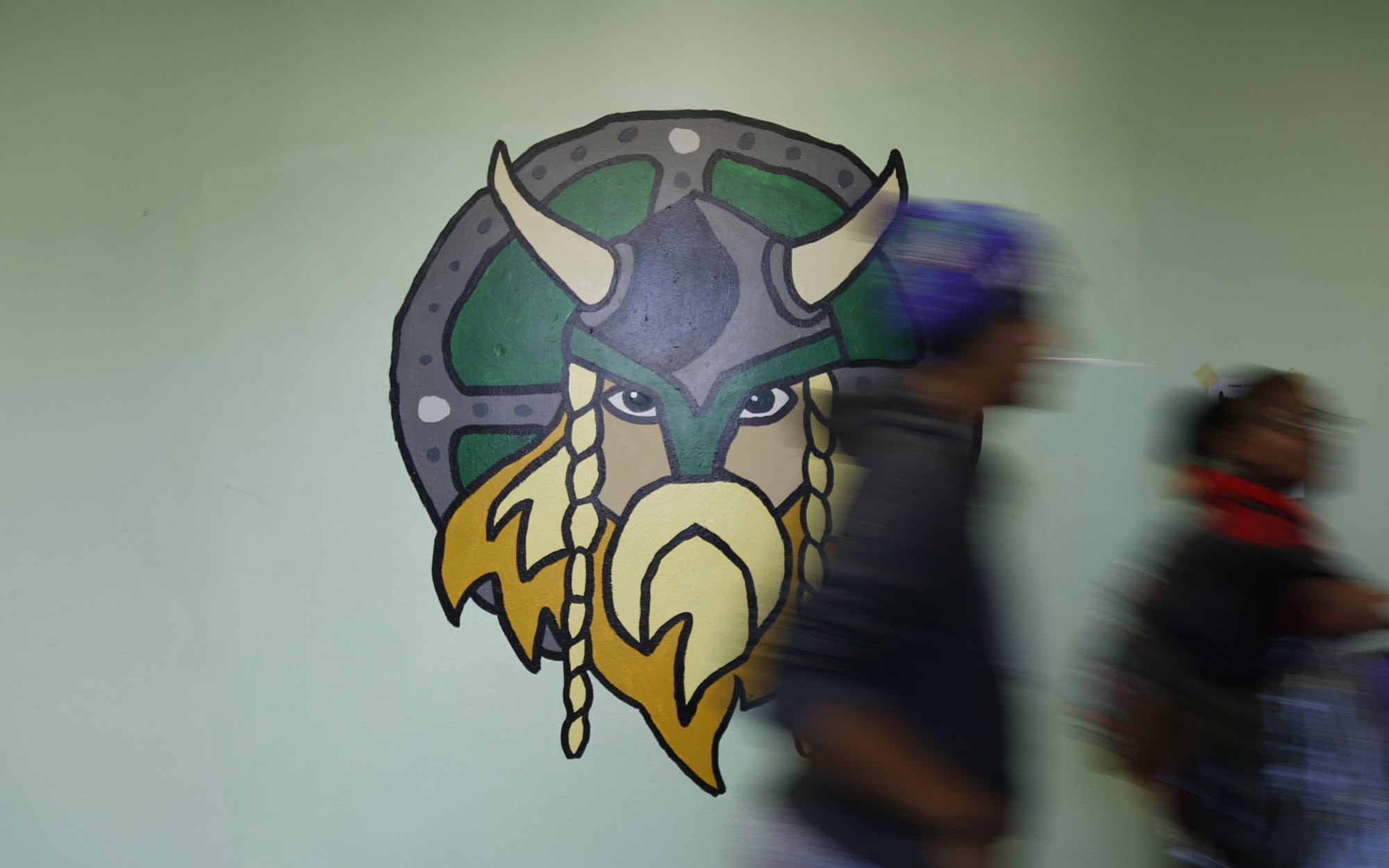 Students walk down a hallway at Sto-Rox Junior-Senior High School.