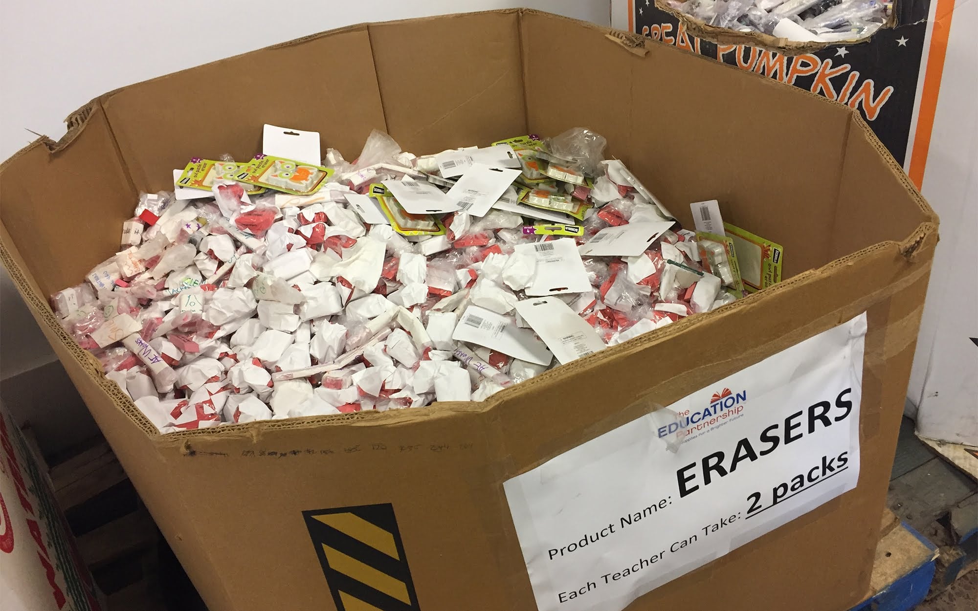 A bin full of erasers is set out at The Education Partnership distribution on March 10.