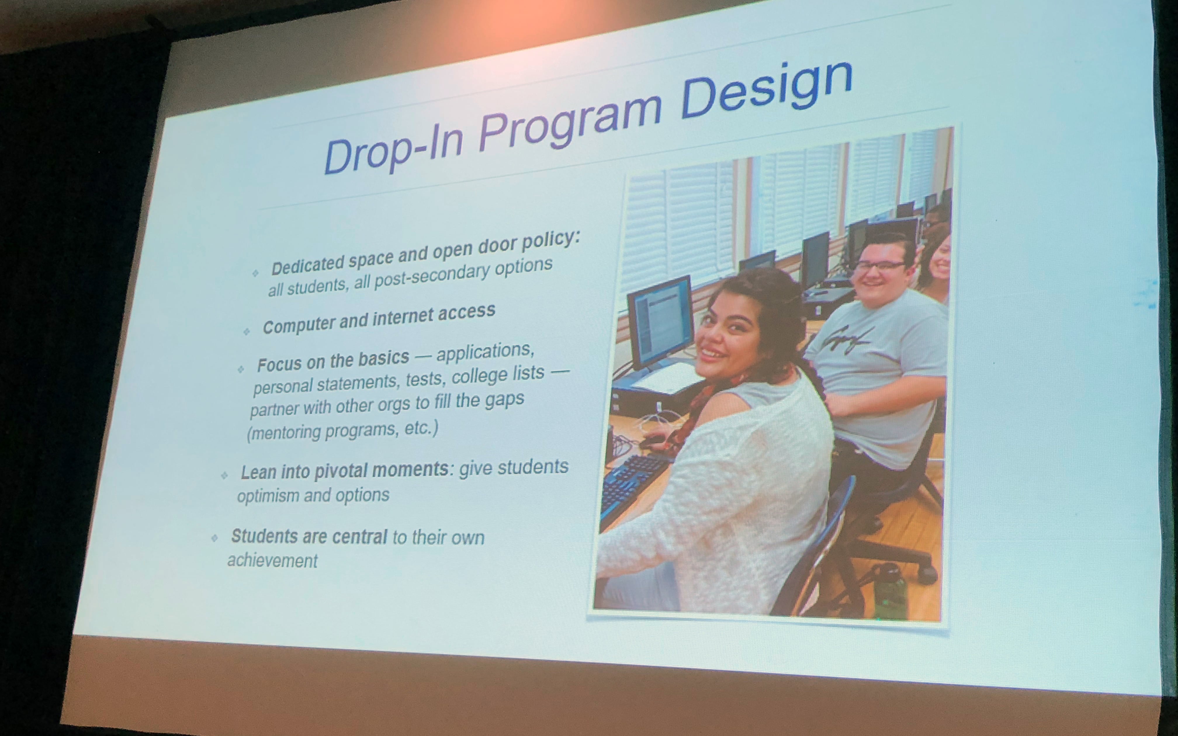 Project SOAR utilizes a “drop-in” model from College Access Plan for its Los Angeles program focused on students ages 15 to 20 in public housing complexes. The presenters included a photo of participating students.